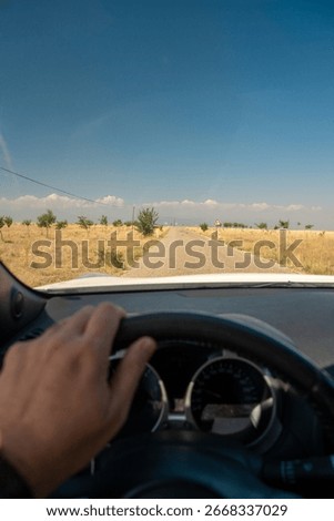 Driving view through car windshield on rural Anatolian road