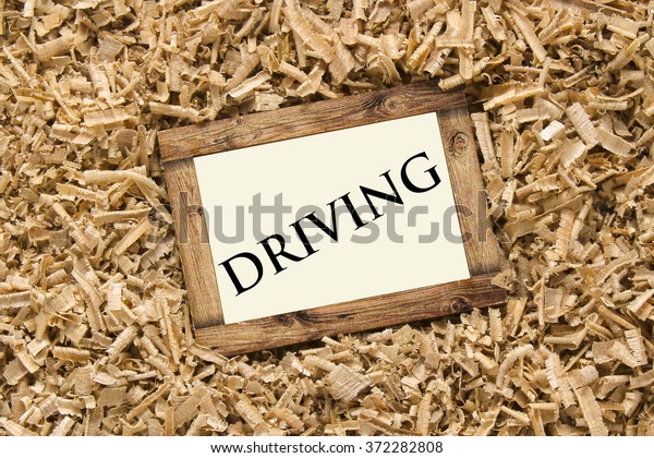 DRIVING word on wood\
frame