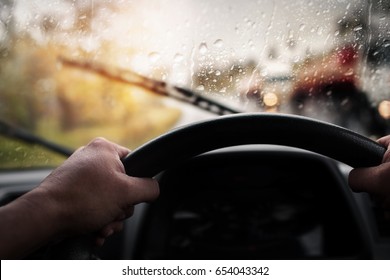 Driving,bad weather conditions on the road during rain storm,selective focus and color toned. 