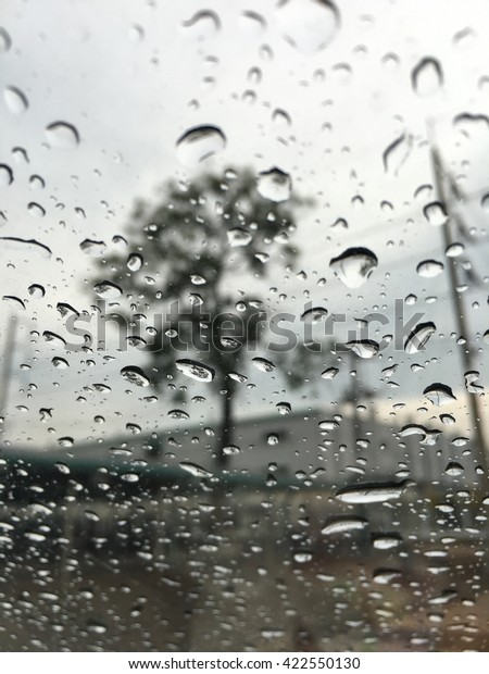 Drizzle\
after rain fall which drop in front of mirror\
car