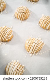 Drizzling Melted White Chocolate Over Freshly Baked Eggnog Scones.