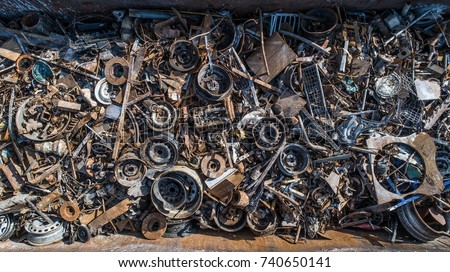 Drone above view on railway wagon filled with scrap metal. Metal recycling
