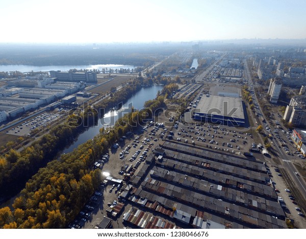 Drone aerial\
image.Parkings and garages in the modern residential area in Kiev.\
October 21,2018,\
Kiev,Ukraine