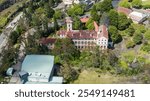 Drone aerial photograph of the old Renaissance Centre building adjacent to the Great Western Highway near the local Cinema precinct in Katoomba in the Blue Mountains in New South Wales, Australia.