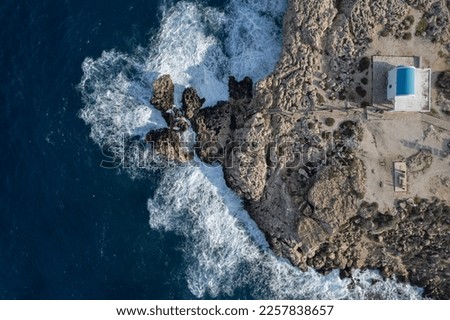 Similar – Aerial Drone View Of Dramatic Ocean Waves Crushing On Rocky Landscape