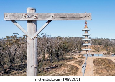 Drone Aerial Photograph Of A Telephone Pole And Wires In A Forest Affected By Bushfires