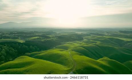 Drone aerial shots of spectacular greenery landscapes and morning sun rising in the sky. Dynamic natural scenery. - Powered by Shutterstock