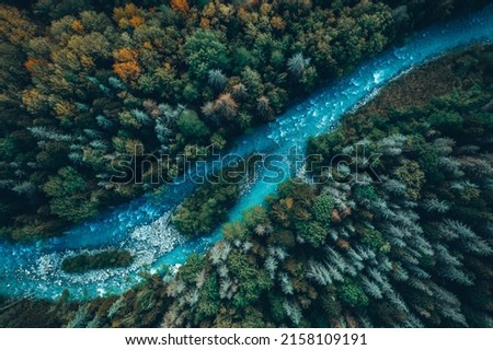 Drone aerial top view of montain river and forest