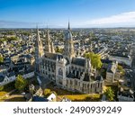  The drone aerial view of Bayeux Cathedral, also known as Cathedral of Our Lady of Bayeux is a Roman Catholic church located in the town of Bayeux in Normandy, France.