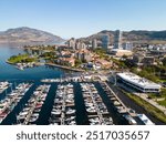 Drone aerial view of the marina yacht club and waterfront of the city of Kelowna, British Columbia, Canada, located in the Okanagan Valley.