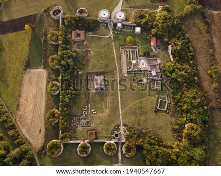 Drone aerial view on Felix Romuliana ancient castle and fortress from roman empire time with walls and buildings remaining located near Zajecar Serbia