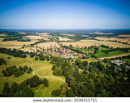 Drone aerial view photo of small town located at typical English countryside landscape, Kent, England.