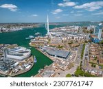 The drone aerial view of Spinnaker Tower and Portsmouth Harbour. Portsmouth is a port city and unitary authority in Hampshire, England.