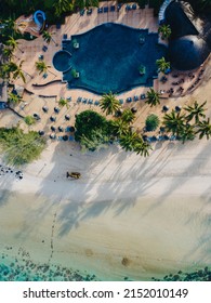 Drone Aerial View Of Tropical Resort , Tropical Resort Aerial Drone View With Pool And Ocean Beach