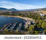 A drone areial view overleooking the marina and Skaha Beach on Skaha Lake, located in the city of Penticton, British Columbia, Canada. Penticton is located in the Okanagan Valley.