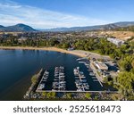 A drone areial view overleooking the marina and Skaha Beach on Skaha Lake, located in the city of Penticton, British Columbia, Canada. Penticton is located in the Okanagan Valley.