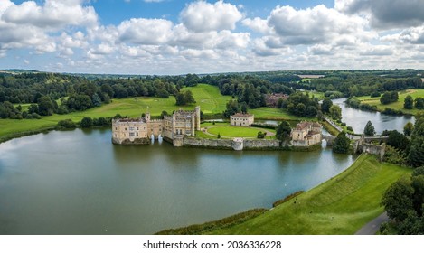 The drone arial view of Leeds castle.Leeds Castle is a castle in Kent, England, southeast of Maidstone. It is built on islands in a lake formed by the River Len.