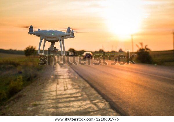 Drone beside a\
road