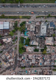 Drone Cityscape Of Lahore Metro Bus Ferozpur Road With Traffic, Buildings And Parks