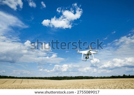 The drone copter flying with digital camera.