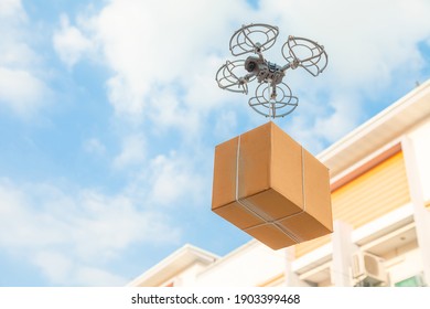 Drone Delivery Delivering Parcel Package Into Urban City. UAV Drone Deliver Give To Female Costumer In Front Of Home. Online Shopping And Express Delivery Transport Service Concept,