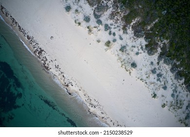 Drone Field Of View Of Of Footprints In The Sand And Water From Above Beach  In Western Australia.