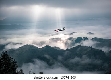 
The Drone Flew Over The Mountain Line With A Beam From The Sun.