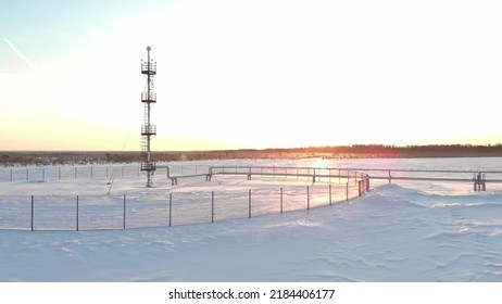 A Drone Flies Over An Emergency Gas Release Tower At An Oil And Gas Extraction And Treatment Facility At An Oil Field In Siberia In Winter. Deliveries Of Oil And Gas From Russia To Europe And The