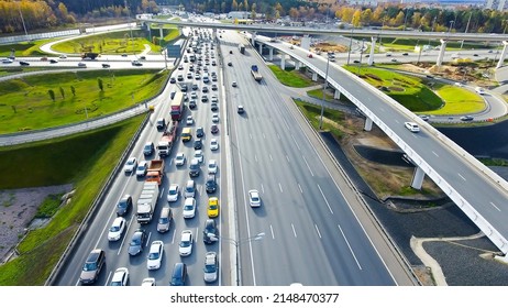 Drone flies over the road urban junction. Highway in Moscow. - Shutterstock ID 2148470377