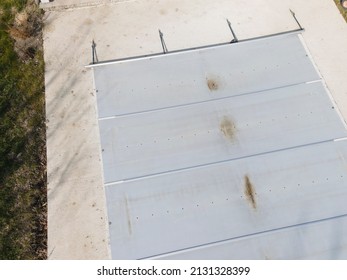 Drone Flight Over A Covered Pool With A Tarp That Is Still Under Construction In A Garden