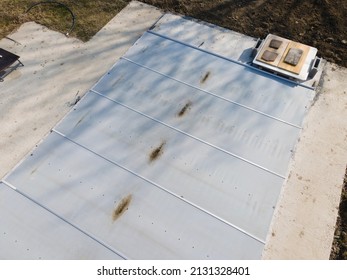 Drone Flight Over A Covered Pool With A Tarp That Is Still Under Construction In A Garden