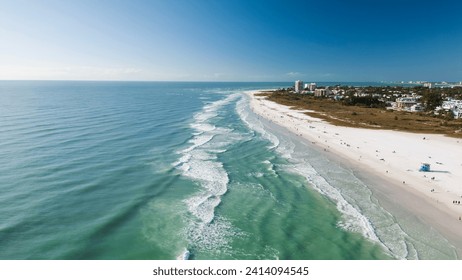 Drone Fly view over beach in Siesta Key,  Florida. Beautiful Siesta Key beach on a sunny day. Turquoise transparent water and blue sea in Siesta Key beach. - Powered by Shutterstock