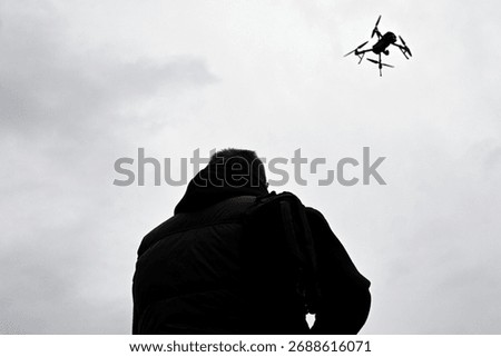 Drone is flying in the sky. Operator controls the drone.  War in Ukraine