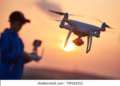 Drone Flying At Sunset