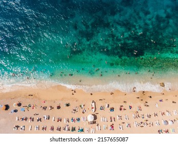 Drone footage of people sunbathing on Kaputaş beach near Kalkan - Kaş, Antalya, Turkey