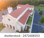 Drone Inspection of Large Church With Red Architectural Style Shingles