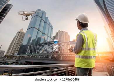 Drone Inspection. Operator Inspecting Construction Building 