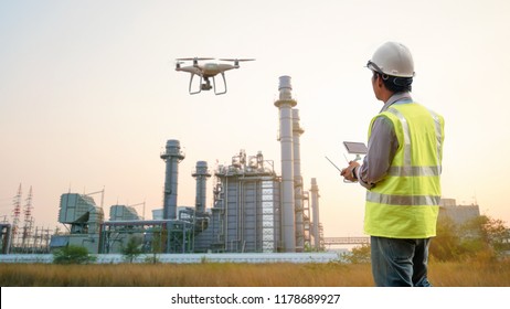 Drone inspection. Operator inspecting construction building  turbine power plant