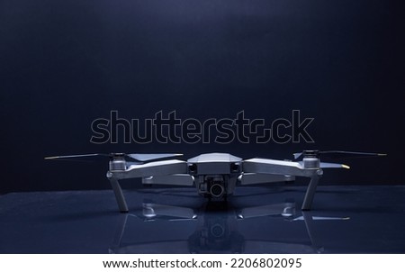 Drone on a dark surface