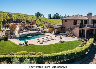 Drone Photo the Beautiful Pool with Water Slide and Backyard Area of Beautiful Spanish Style Home on a 75 Acre, Sonoma Wine Country Estate, Horse Property
