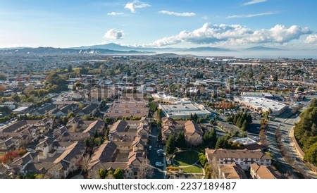 Drone photo over the City of San Pablo, California in Contra Costa County with streets and neighborhoods with homes