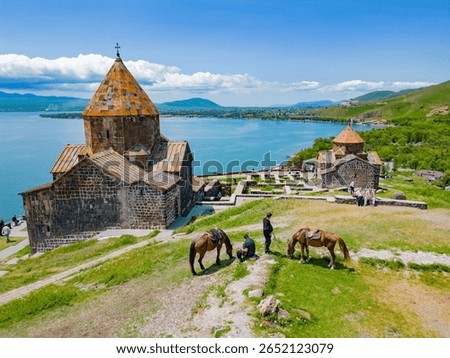 Drone photo of Sevanavank Monastery with horses