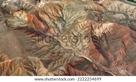 A drone photograph of the mountains in Aksaray, Turkey. Bird's eye view of brown mountain.