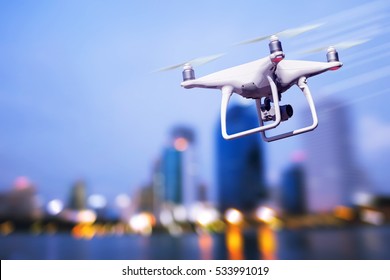 drone photography camera. videography pilot drone . photo city night .quadcopter with high resolution digital technology  camera on the sky .robot drone photography industry ,commercial concept   