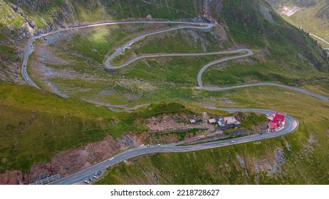 Drone Photography Of The Famous Transfagarasan Road, In Romania. Photography Was Taken From A Drone With Camera Tilted Horizontally For A Panoramic Shot Of The Curvy Road.