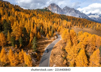 Drone Photos Of Windy Roads In The Dolomites Mountains In Italy With Colorful Fall Colors. 