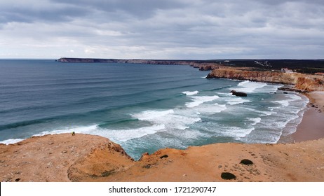 Drone picture of an Beach with Waves and cliffs