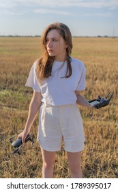 Drone Pilot Woman. Professional UAV Operator In The Agricultural Field