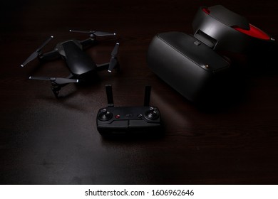 Drone quadcopter with a flight remote controller and vr goggles.