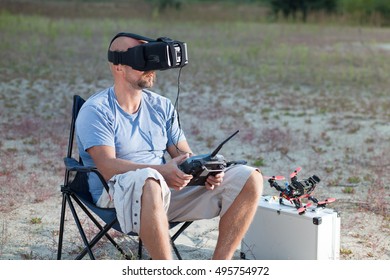 Drone Racing Pilot Sitting Outdoors